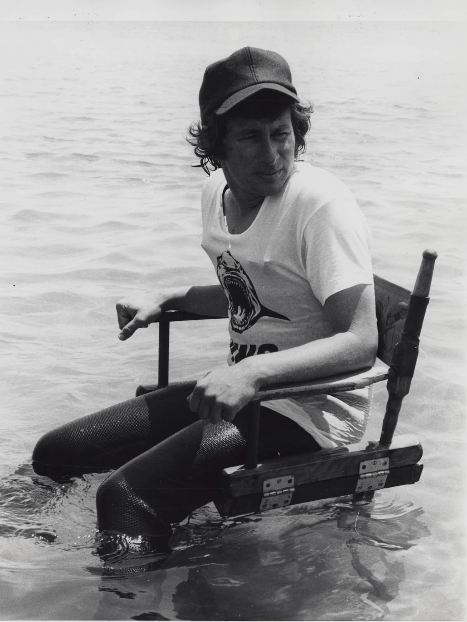 Steven Spielberg sitting in director's chair in Ocean