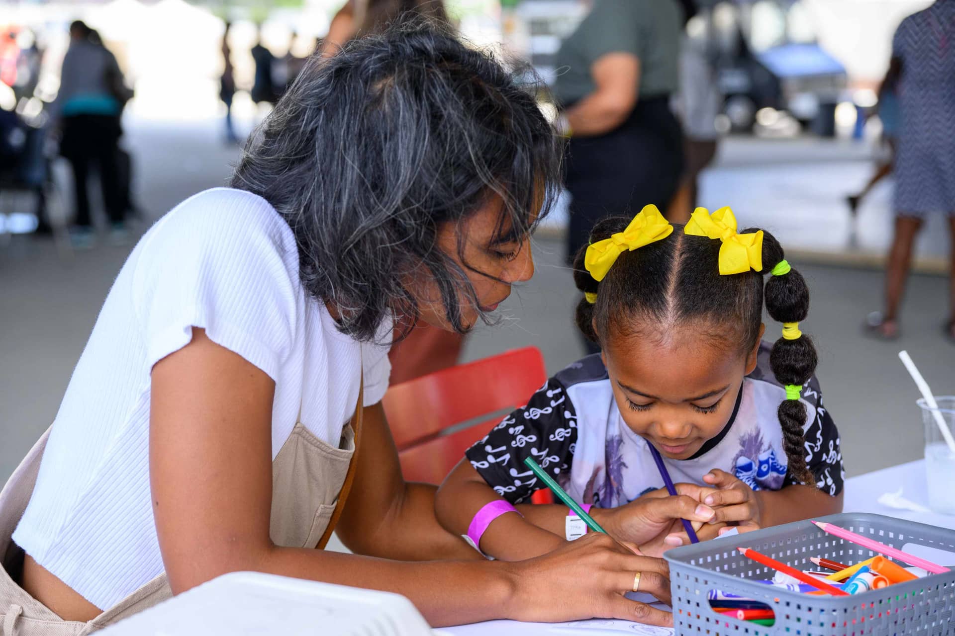 Mother and Child making art and drawing outside