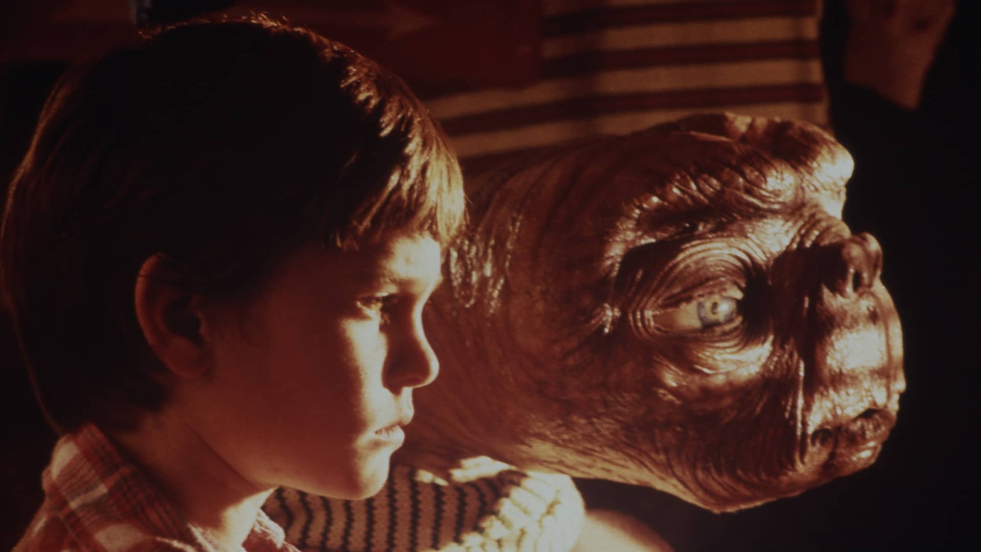 E.T. The Extraterrestrial follows Elliott, a 10-year-old boy, who develops a close bond with an alien being he shelters who was left behind on Earth.