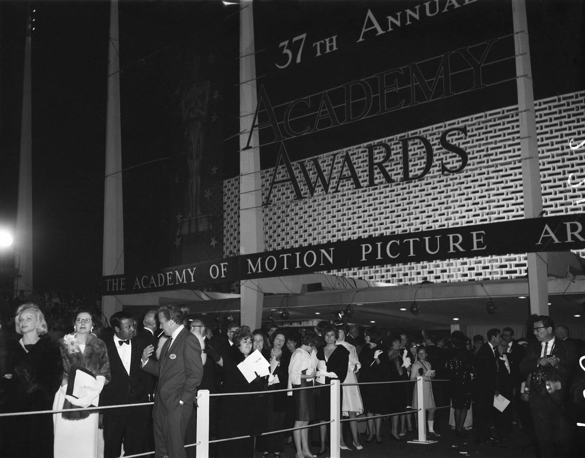 Guests entering the Santa Monica Civic Auditorium, the night of the 1964 Academy Awards ceremony
Courtesy of Academy Awards show photographs, Margaret Herrick Library, Academy of Motion Picture Arts and Sciences