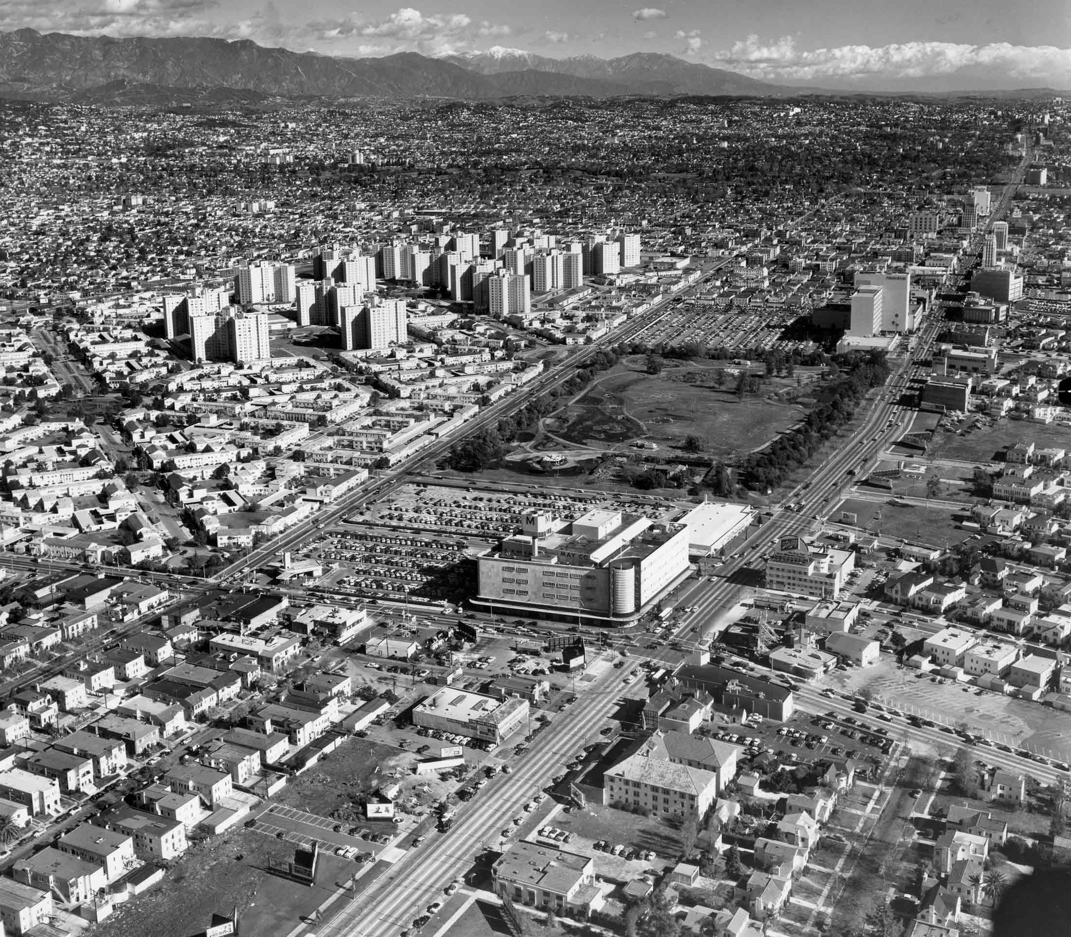An aerial view of the Miracle Mile, the intersection of Fairfax Avenue and Wilshire Boulevard, and the May Company department store (center)
Courtesy of Bison Archives photographs collected by Marc Wanamaker, Margaret Herrick Library, Academy of Motion Picture Arts and Sciences