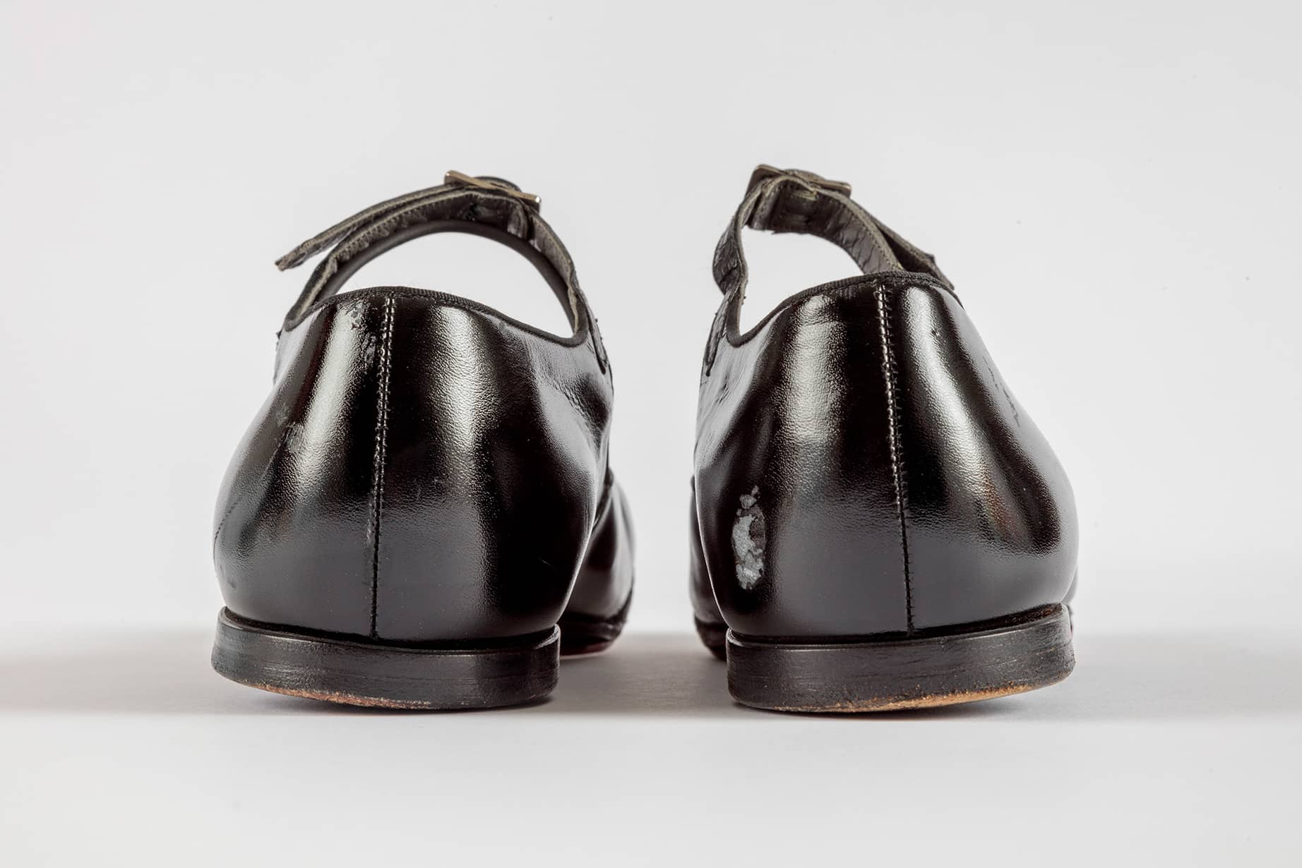Shirley Temple's tap shoes and practice steps used during filming of <i>The Little Colonel</i> (1935). Academy Museum of Motion Pictures, Gift of Shirley Temple Black and Family. Photo by Joshua White, JWPictures/©Academy Museum Foundation
