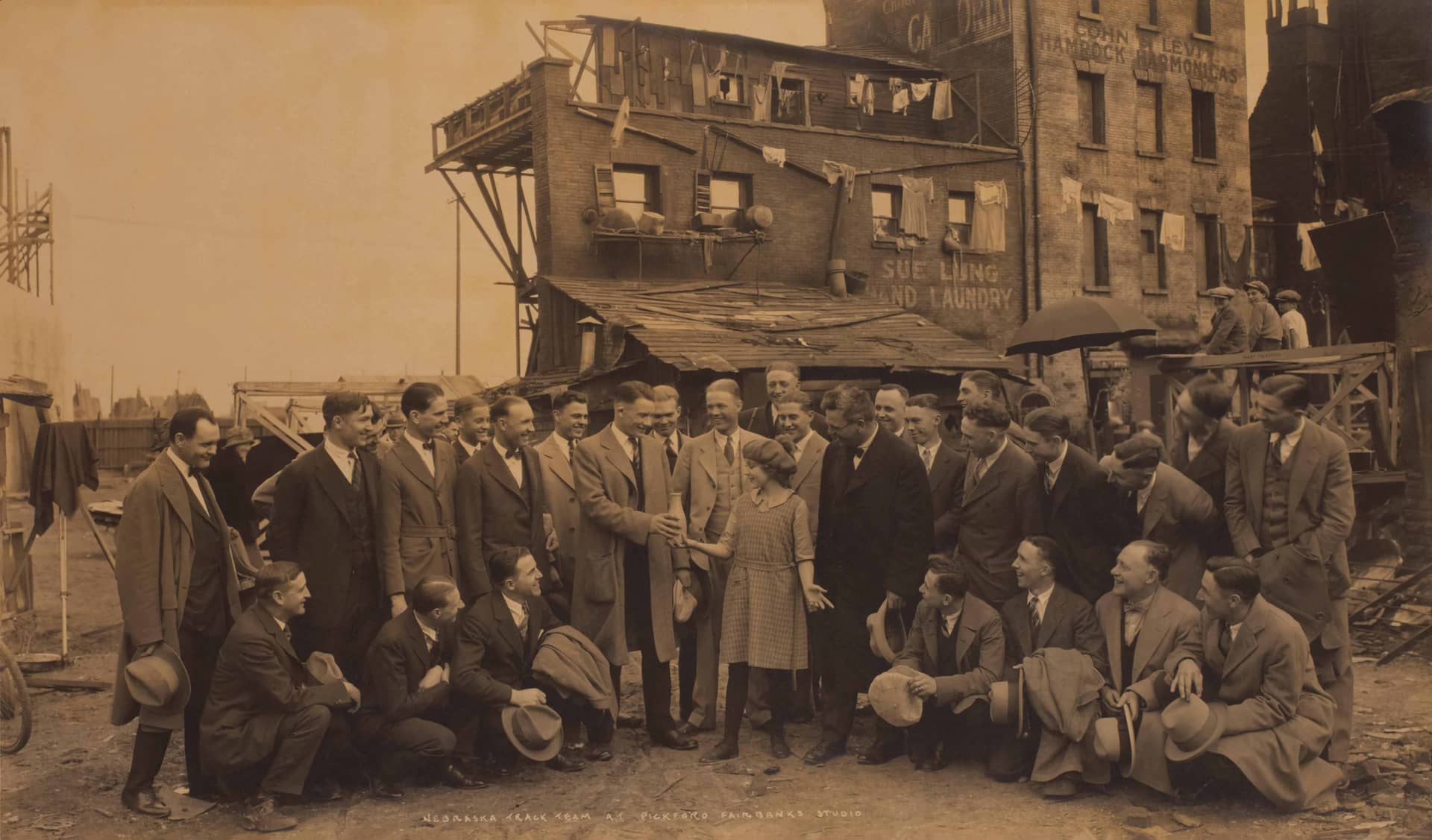 Mary Pickford visiting with Nebraska Track Team at Pickford-Fairbanks Studio in West Hollywood on June 1, 1920, photo by JT Vintage, courtesy of Glasshouse Images/Alamy Stock Photo.