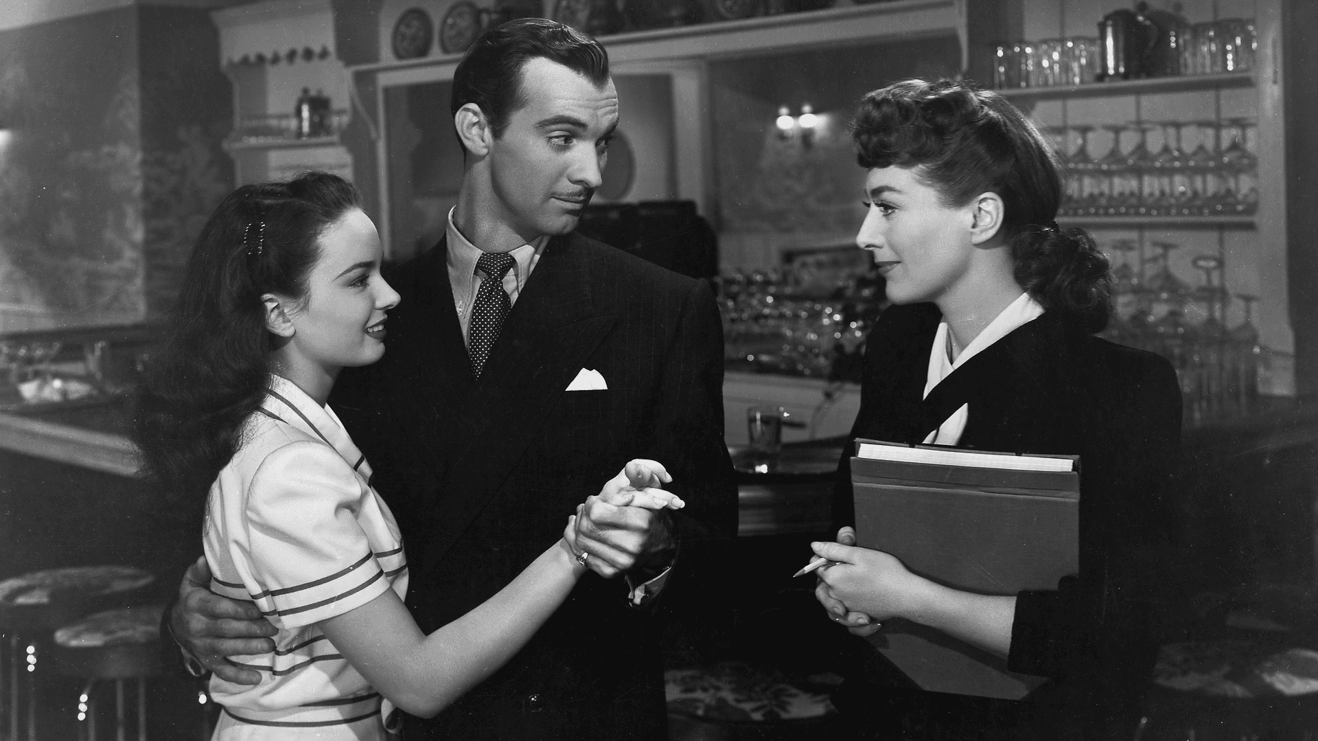 Joan Crawford earned the Best Actress Oscar for her heartfelt portrayal of a woman trying to run a business and raise two daughters while coping with the unsatisfactory men in her life.