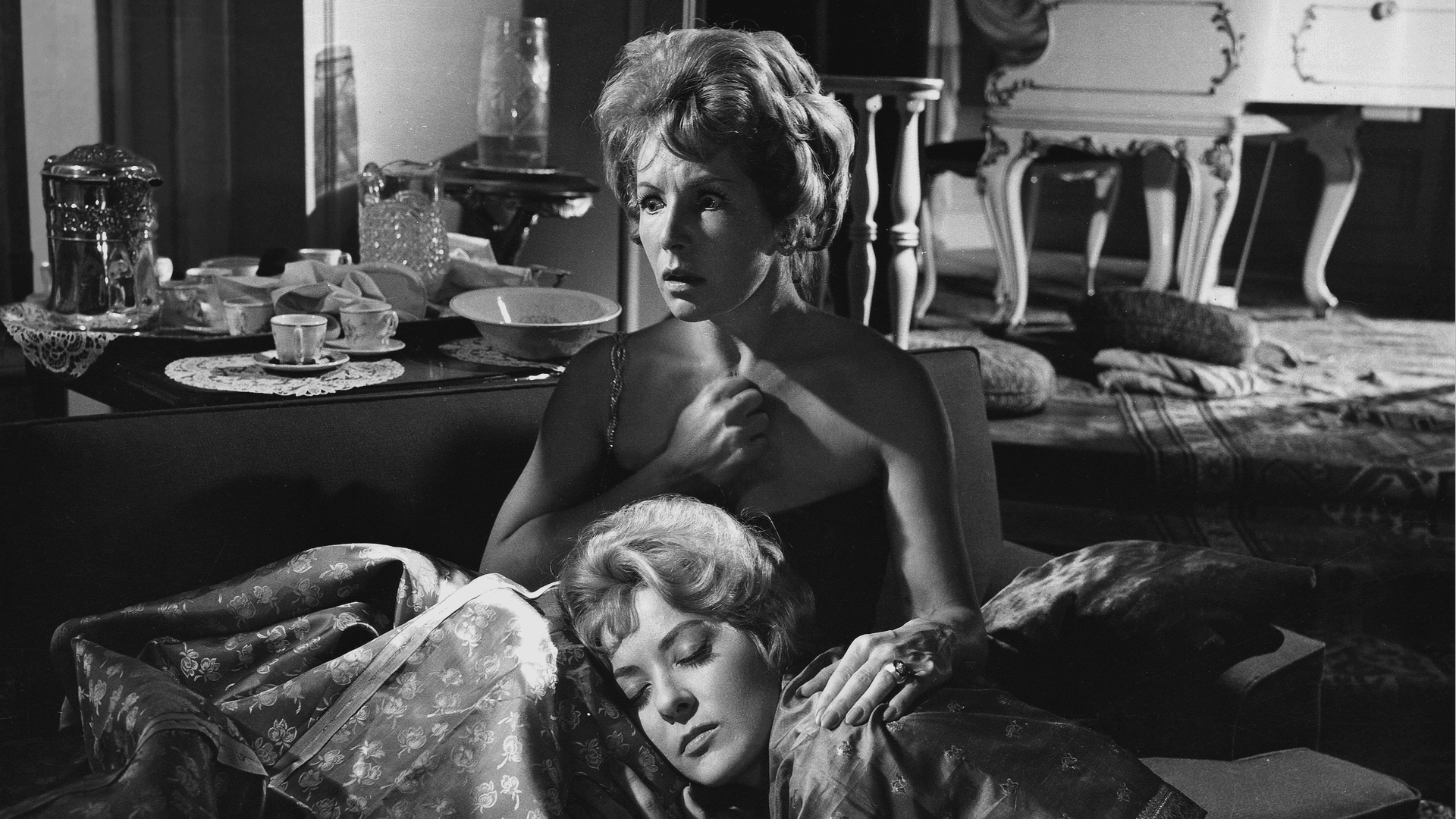 Inspired by the angel of death, Luis Buñuel’s original script is a pitch-black satire about a wealthy group of friends who find themselves unable to leave a room after a dinner party.